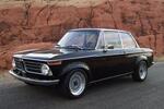 1973_BMW_2002_Flared_and_Restored_Black_Front_1.jpg